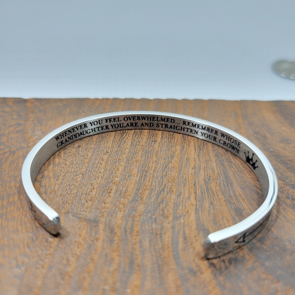 Silver Colored Bracelet With Arrows On The Outside And A Saying On the Inside - Picture 3 of 4